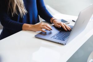 Blue Sweater Woman Typing